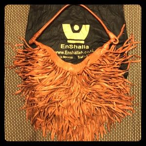 EnShalla brown fringed shoulder bag.